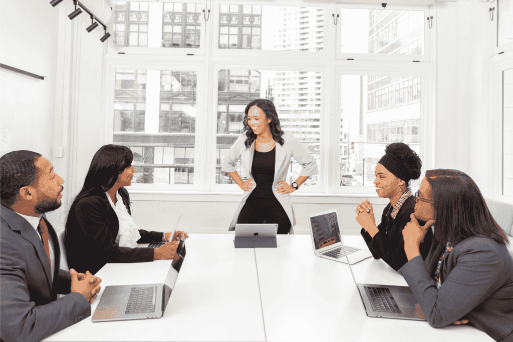 Businesswoman leading a team building meeting