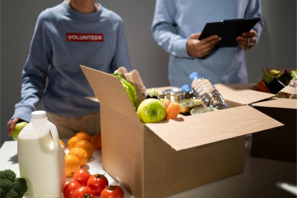 volunteers packing donation box