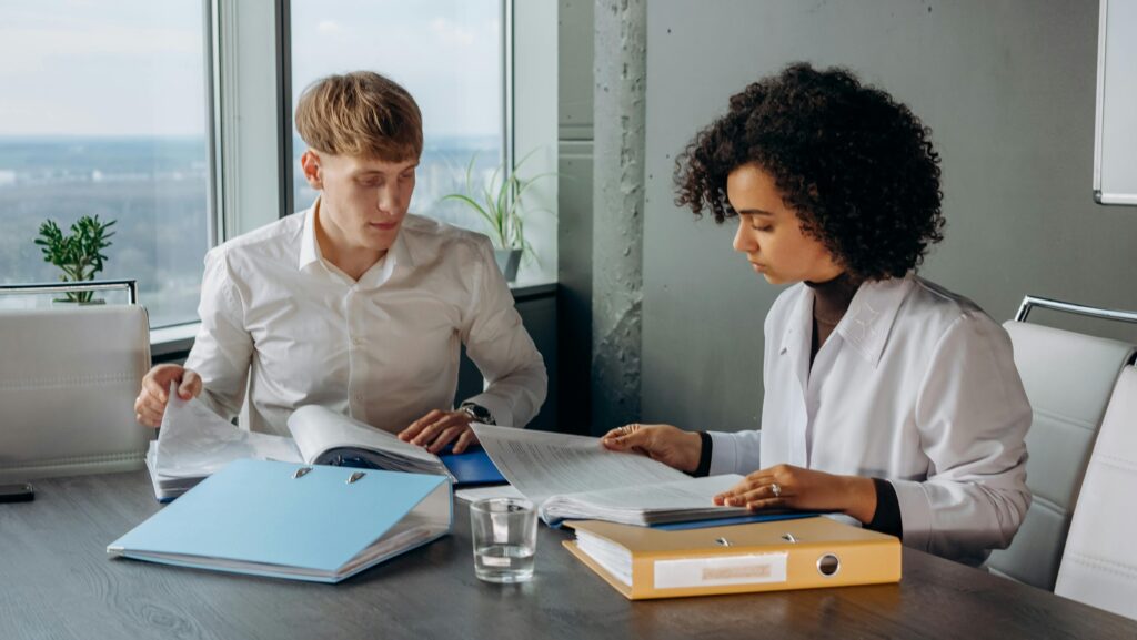 Millennial coworkers working together