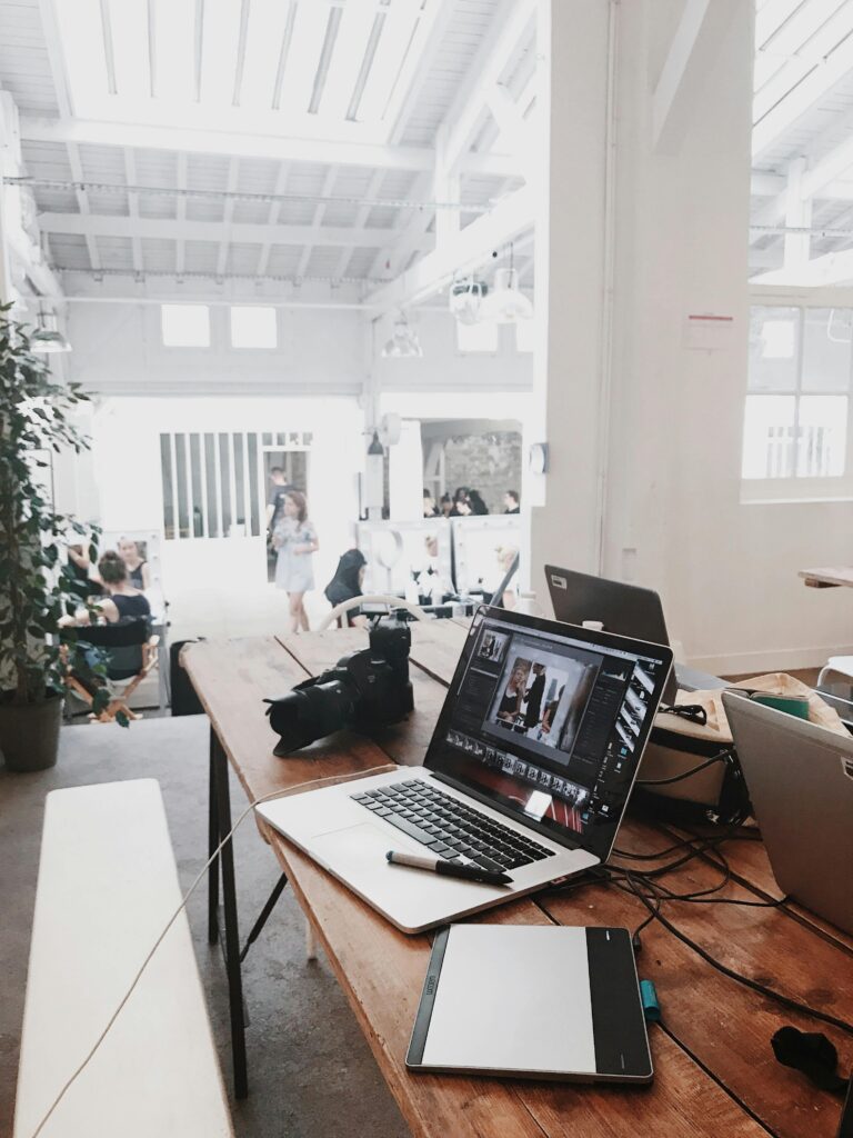 laptop and tech equipment in modern office space