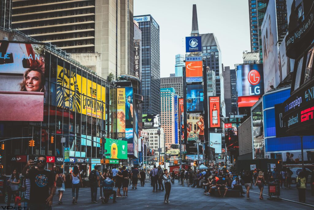 Scenic picture of brightly lit Times Square, NYC