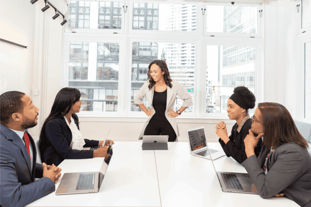 Confident businesswoman leading a team meeting