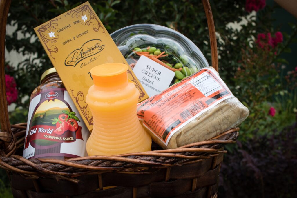 a gift basket full of healthy foods and drinks for administrative professionals day