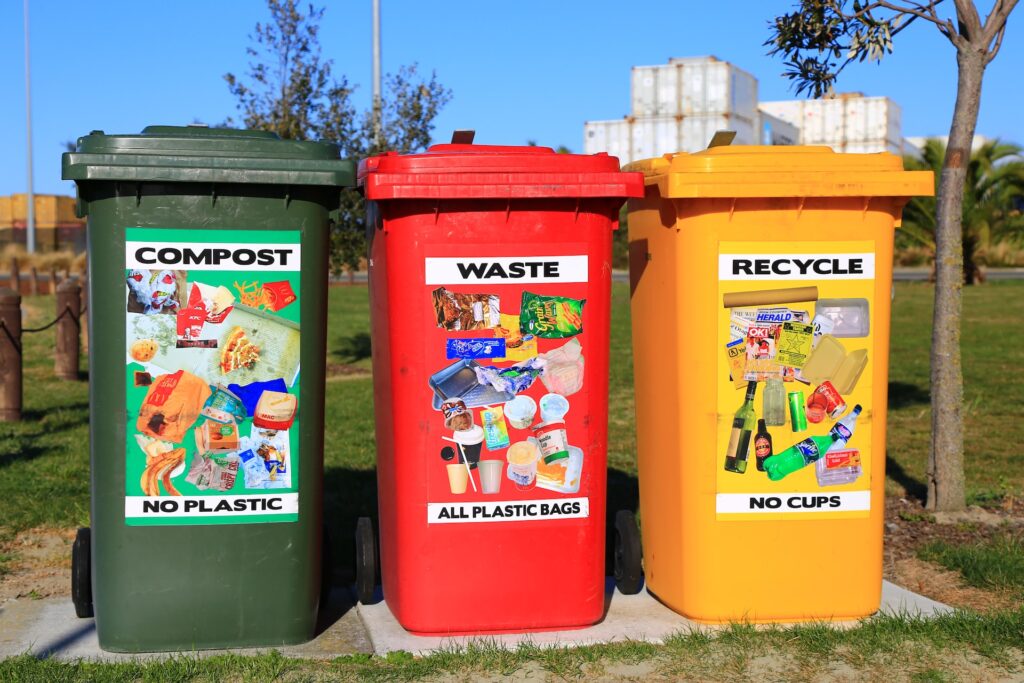 Three bins for compost waste and recycling