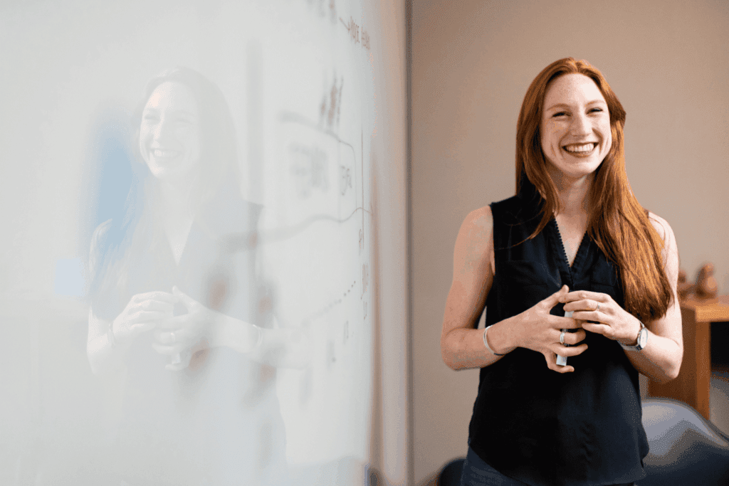 A team leader fosters collaboration and engagement while guiding colleagues through a brainstorming session.