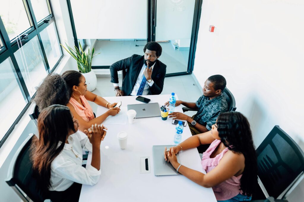 Team meeting in a modern office focused on strategy, collaboration, and workplace communication.