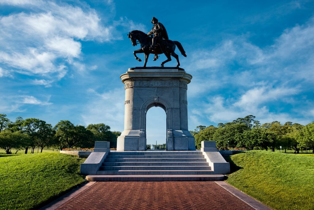 Sam Houston equestrian monument in Hermann Park Houston Texas under a bright blue sky