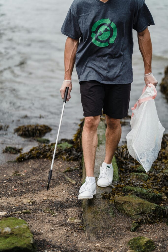 Man doing a beach clean up 