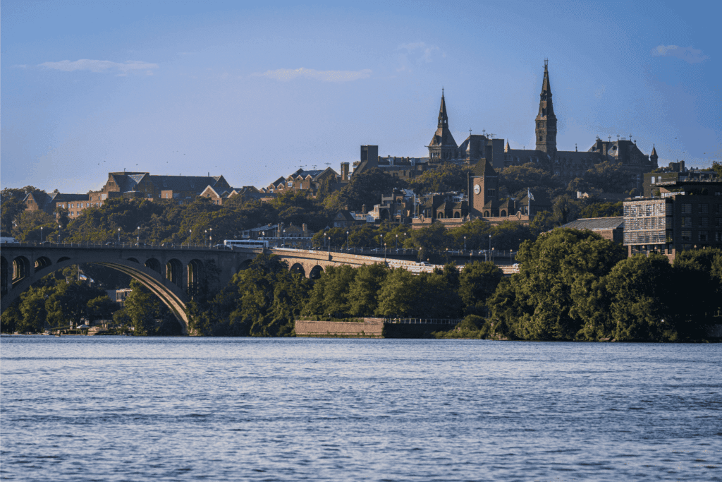 View of Georgetown University and Key Bridge over the Potomac River in Washington DC, perfect for kayaking and waterfront activities