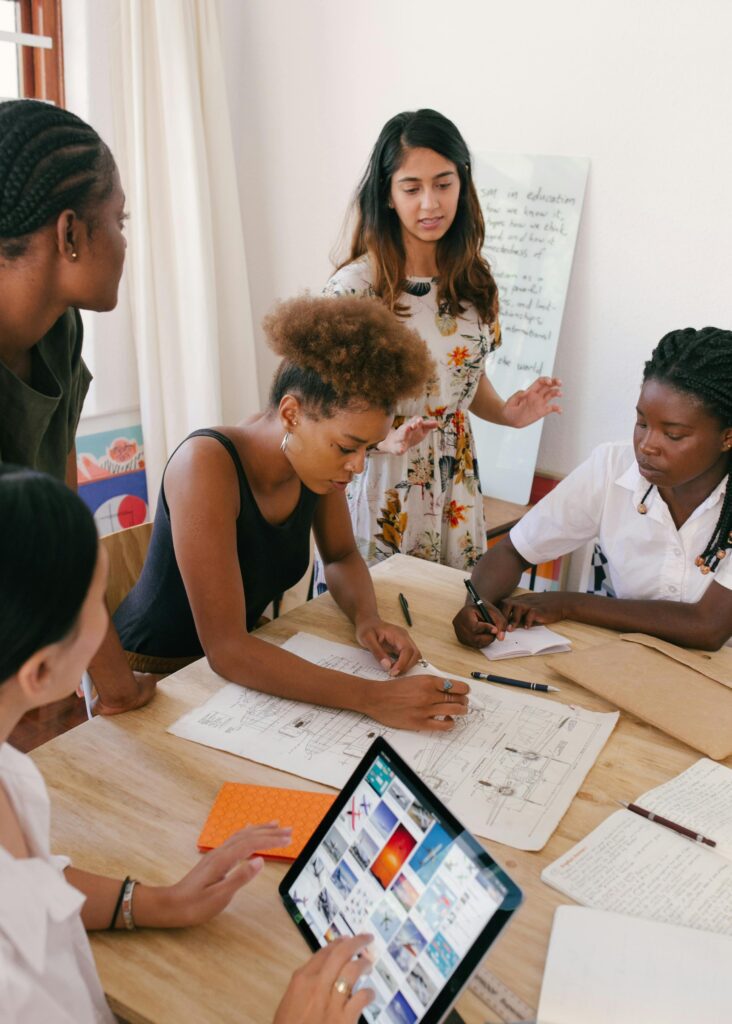 A group of professionals creatively brainstorming around a table